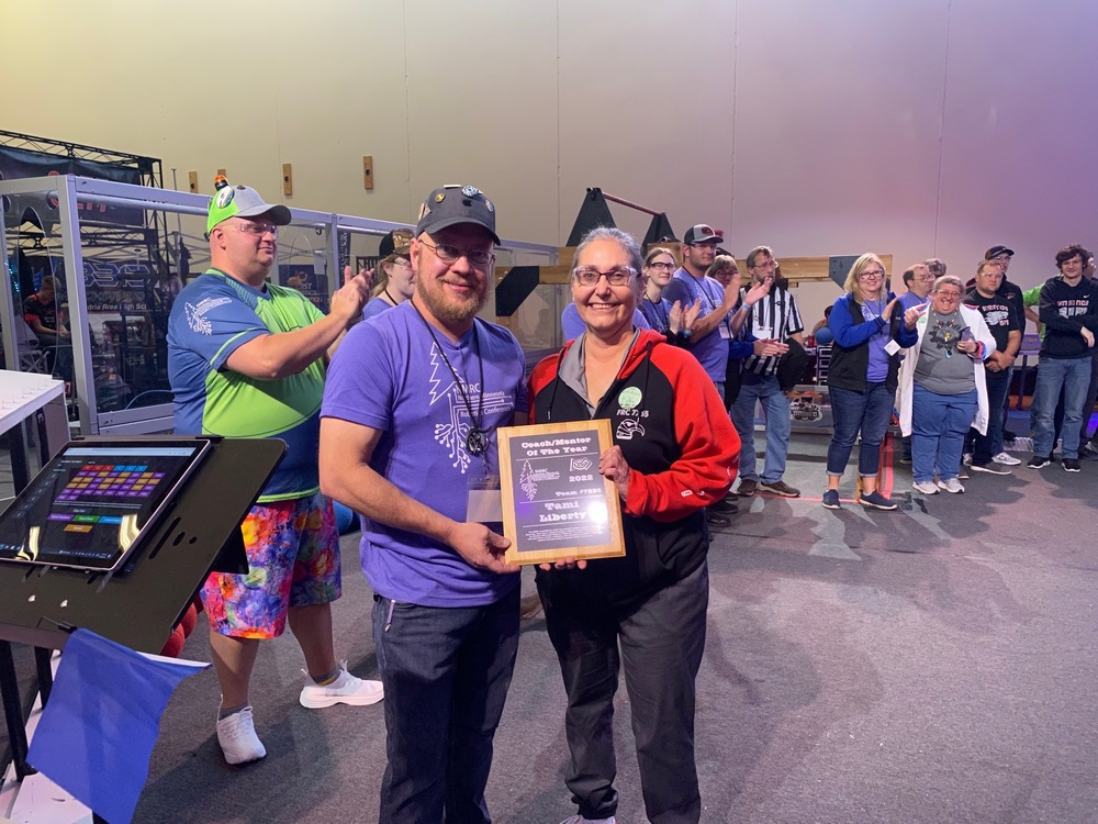 Pictured: (Left) NMRC President Jesse Frost & (Right) 2022 NMRC” Coach/Mentor of the Year” Tami Liberty Team 7235 - Ogichidaag from Red Lake H.S.