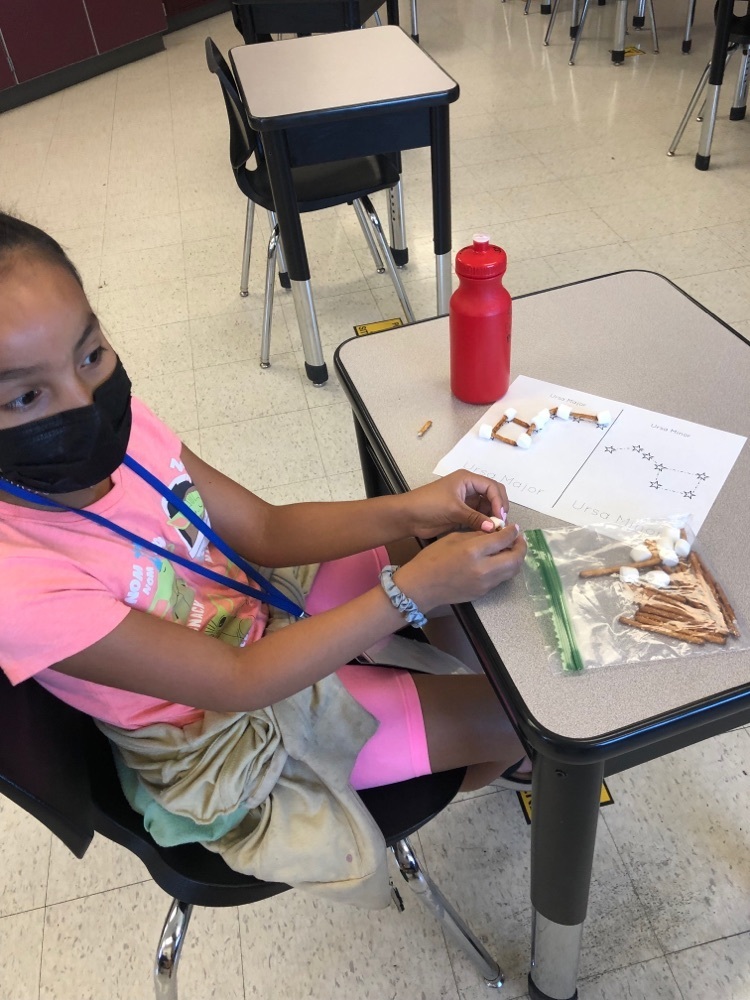 student making constellation